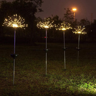 Jardin lampe solaire style pissenlit en rangée sur pelouse