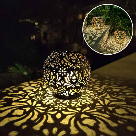 lanterne solaire fer forgé motif lumineux fleurs décore éclaire