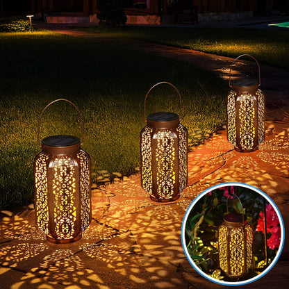 lanterne solaire pour jardin posée sol jeux lumière décoratif